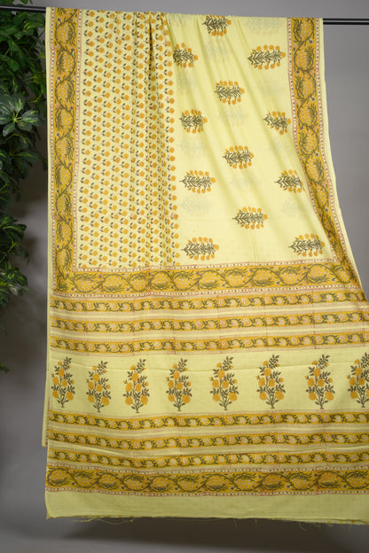 Pastel yellow Bagru Handblock printed MulMul cotton saree | Looms & Tassels
