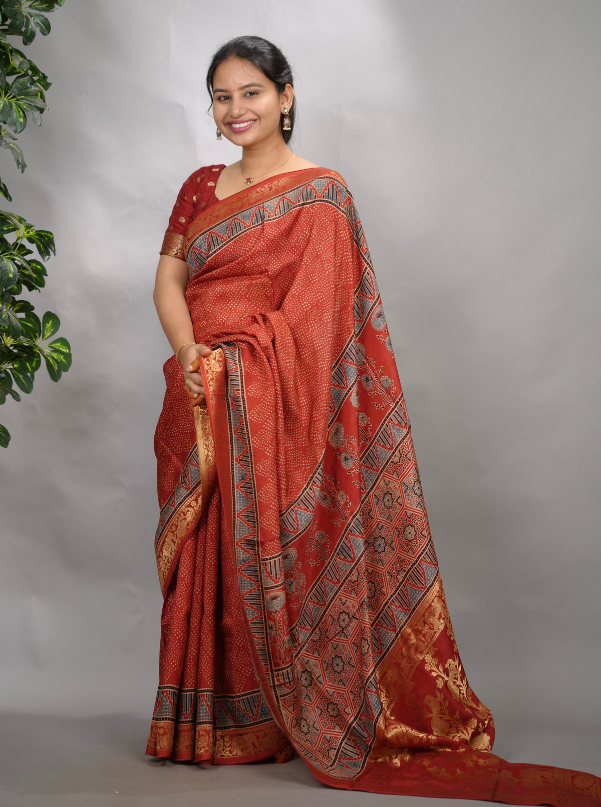 Maroon Ajrakh Handblock printed Dola Silk Saree| Looms & Tassels
