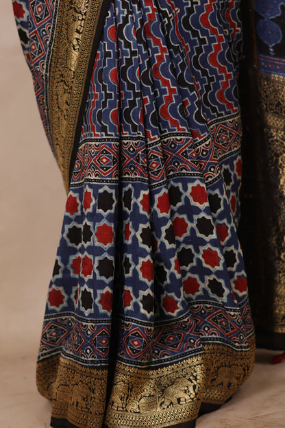 Indigo Ajrakh Handblock printed Dola Silk Saree | Looms & Tassels