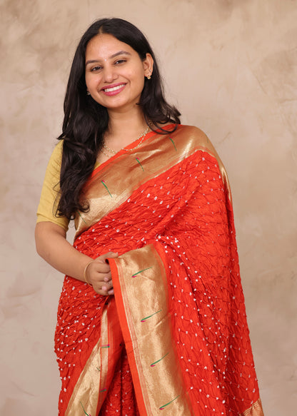Orange Handcrafted Bandhani Paithani Dola Silk Saree | Looms & Tassels