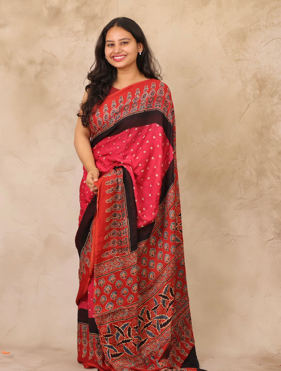 Pink Hand Knotted Ajrakh Bandhej Modal Silk Saree | Looms & Tassels