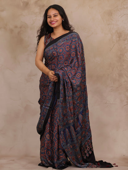 Indigo Handcrafted Ajrakh Modal Silk Saree with Authentic Banjara Mirror Work | Looms & Tassels