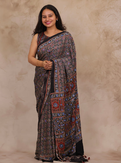 Black Handcrafted Ajrakh Modal Silk Saree with Authentic Banjara Mirror Work | Looms & Tassels