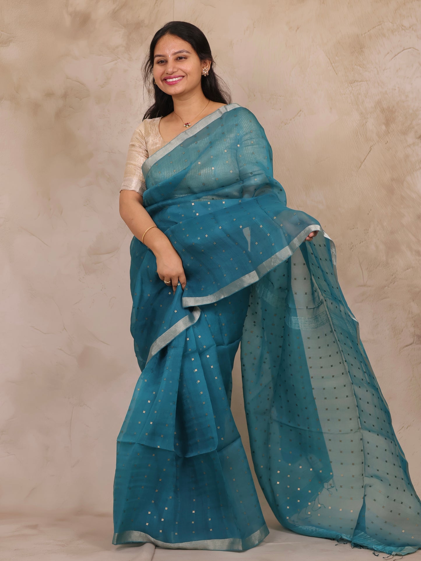 Teal Blue Handwoven Muslin Silk Saree With Sequence Work | Looms & Tassels