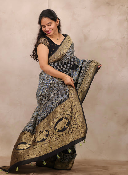 Black Ajrakh Handblock printed Dola Silk Saree | Looms & Tassels