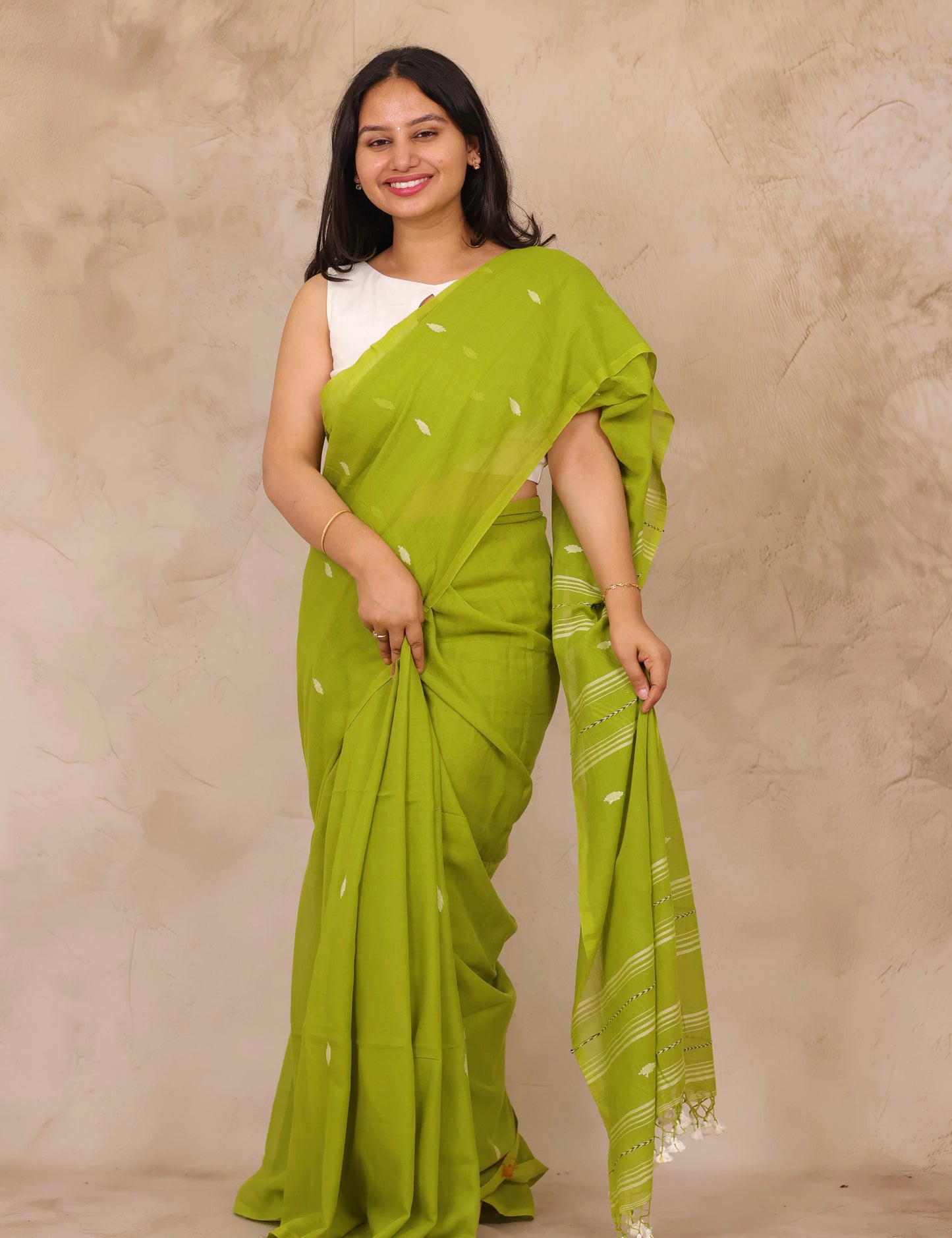 Parrot Green Malai Cotton Saree with Butta Weaving | Looms & Tassels