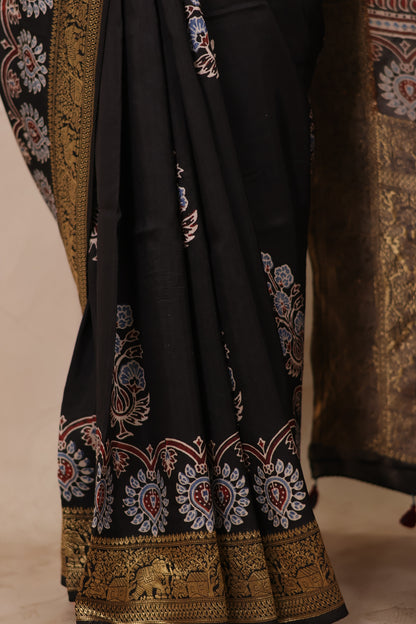 Black Ajrakh Handblock printed Dola Silk Saree | Looms & Tassels