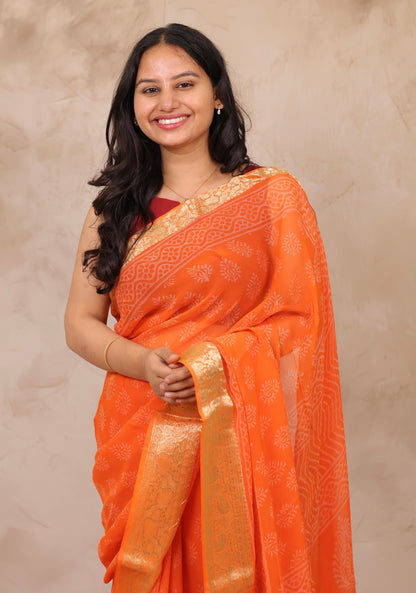 Orange Chiffon Hand Block Printed Saree with Jari Border | Looms & Tassels