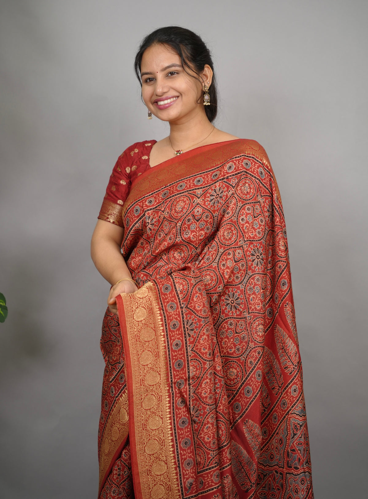 Maroon Ajrakh Handblock printed Dola Silk Saree| Looms & Tassels