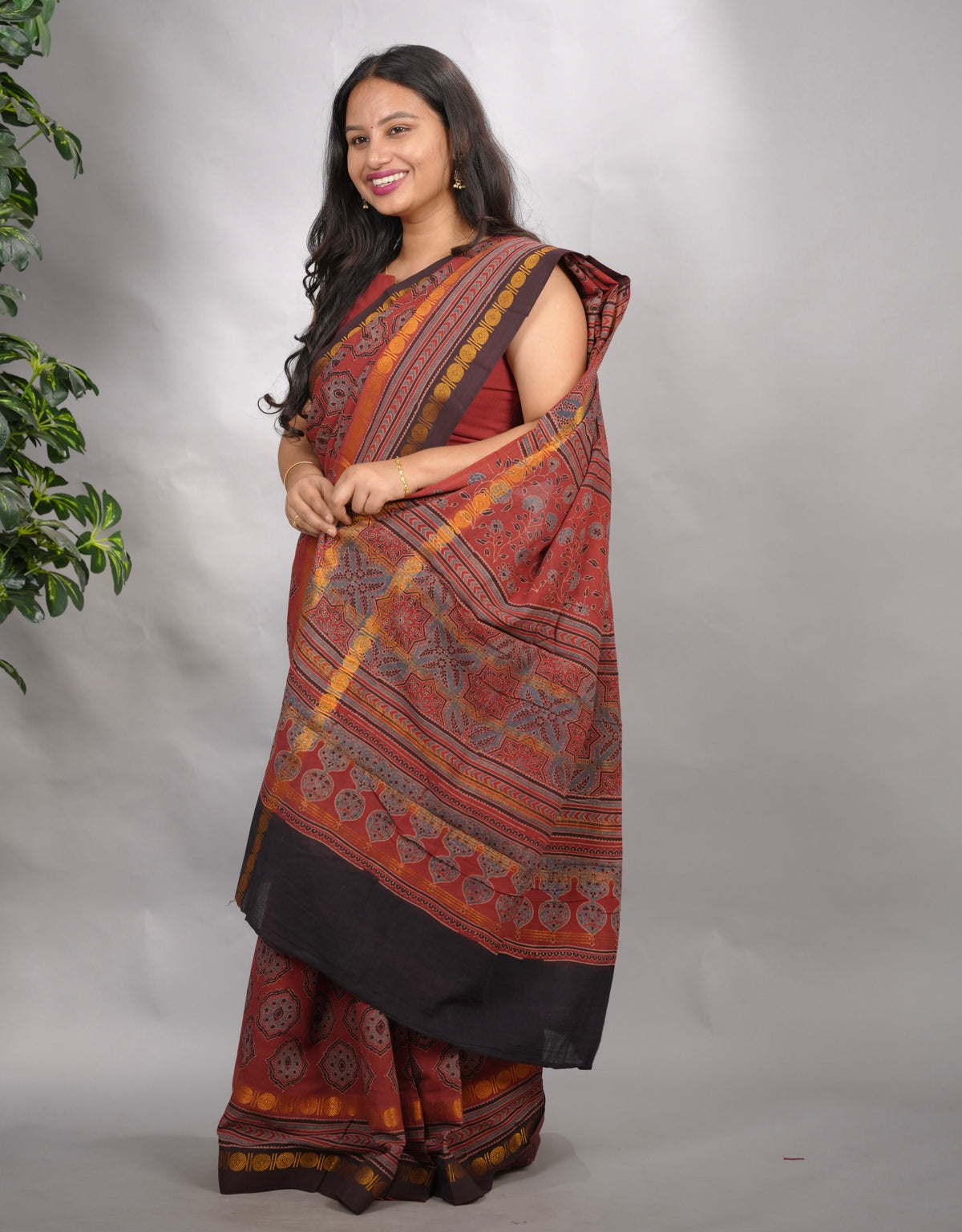 Maroon Ajrakh Hand Block Printed Sungudi Cotton Saree | Looms & Tassels