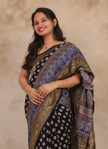 Black Ajrakh Handblock printed Dola Silk Saree | Looms & Tassels