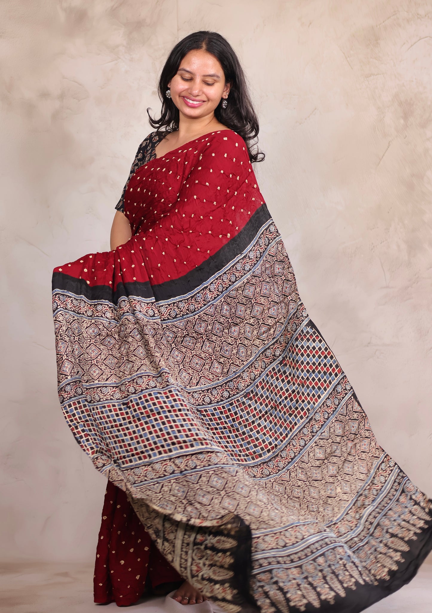 Maroon Hand Knotted Bandhej Modal Silk Saree with Ajrakh Pallu | Looms & Tassels