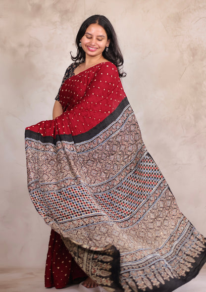 Maroon Hand Knotted Bandhej Modal Silk Saree with Ajrakh Pallu | Looms & Tassels