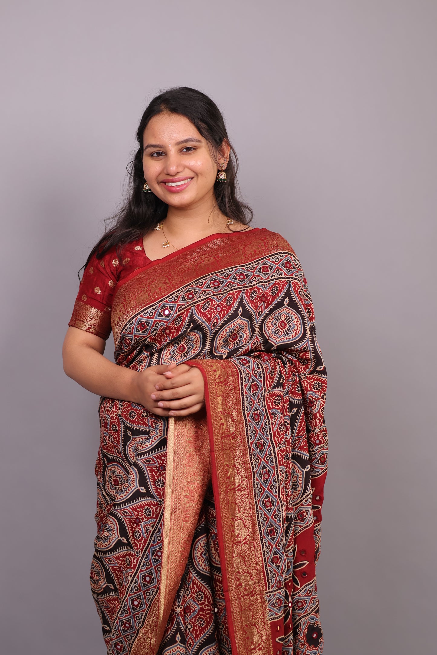 Red & Black Handcrafted Ajrakh Dola Silk Saree with Authentic Banjara Mirror Work | Looms & Tassel