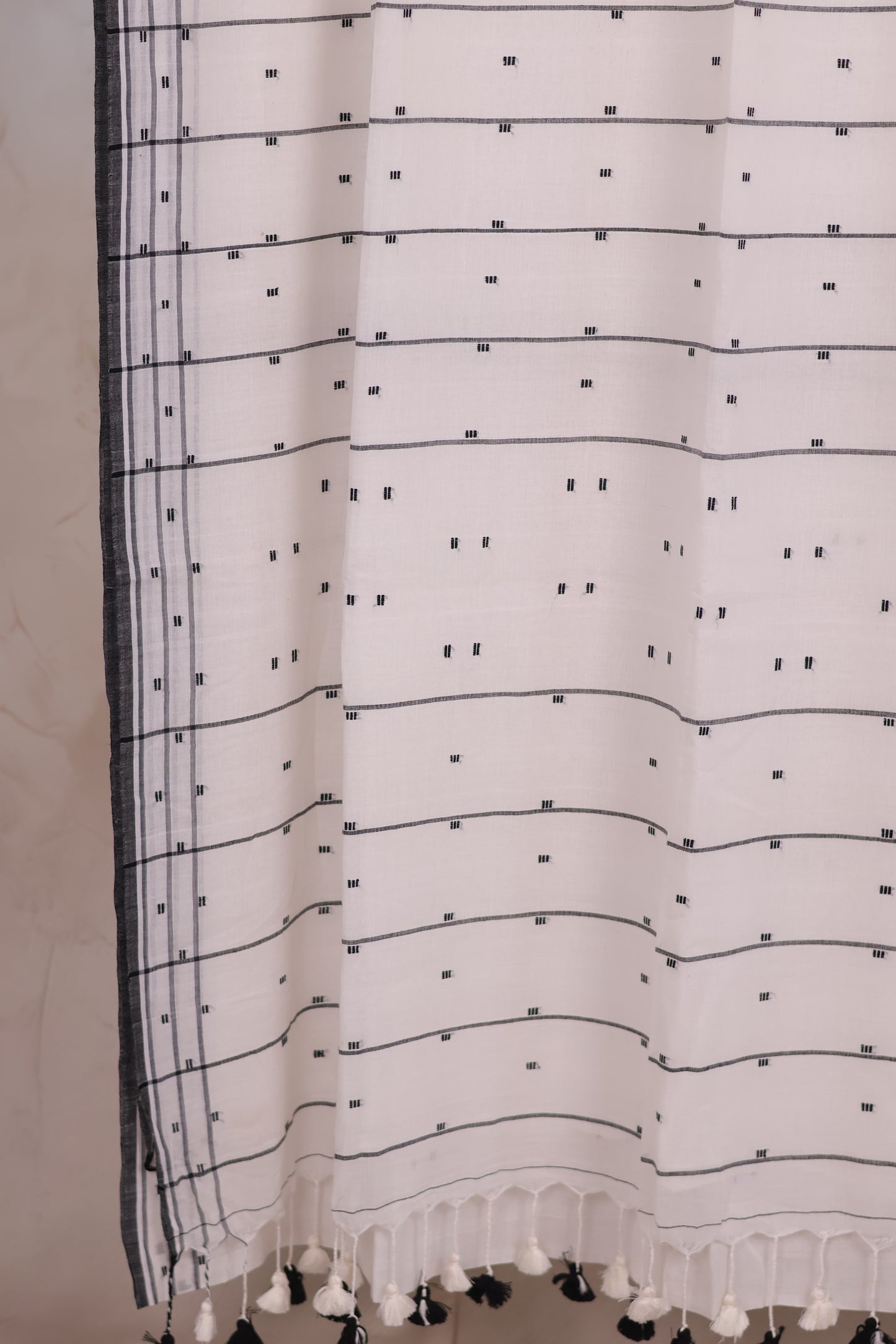 White Malai Cotton Saree with Butta Weaving | Looms & Tassels