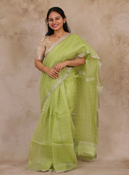 Pastel Lime Green Handwoven Muslin Silk Saree With Sequence Work | Looms & Tassels