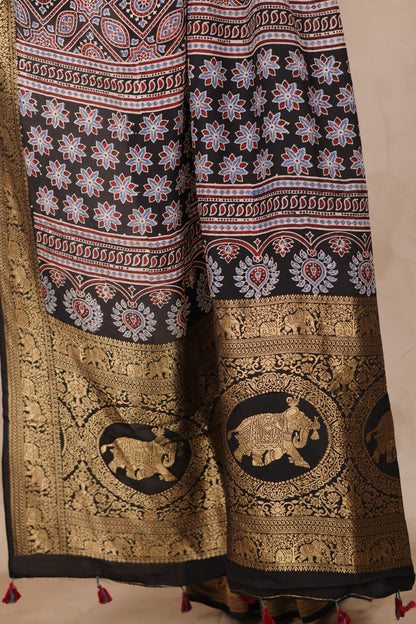 Black Ajrakh Handblock printed Dola Silk Saree | Looms & Tassels
