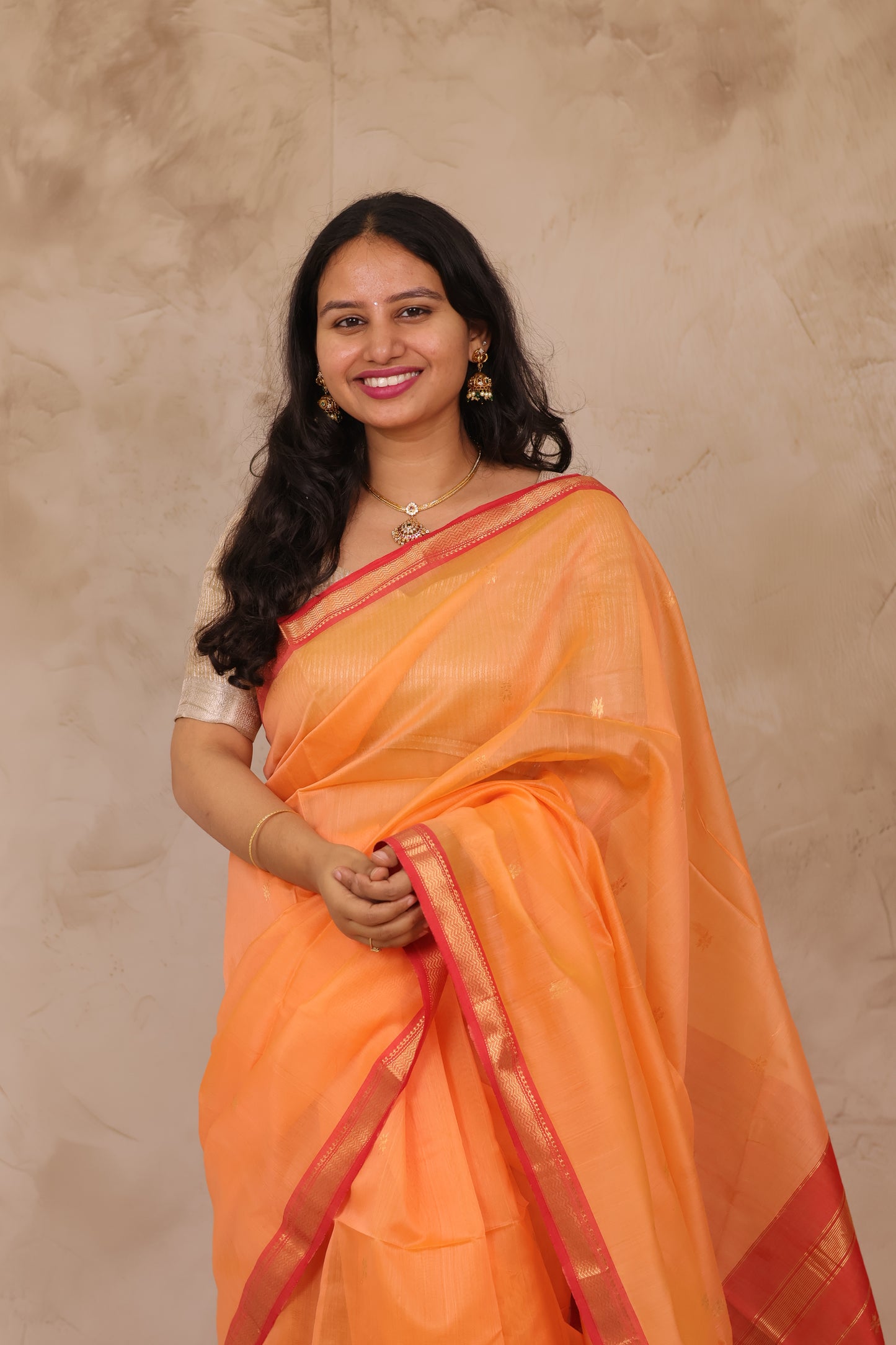 Pastel Orange Handloom Maheswari Silk Cotton Sarees | Looms & Tassels