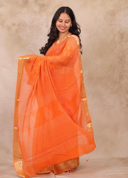 Orange Chiffon Hand Block Printed Saree with Jari Border | Looms & Tassels