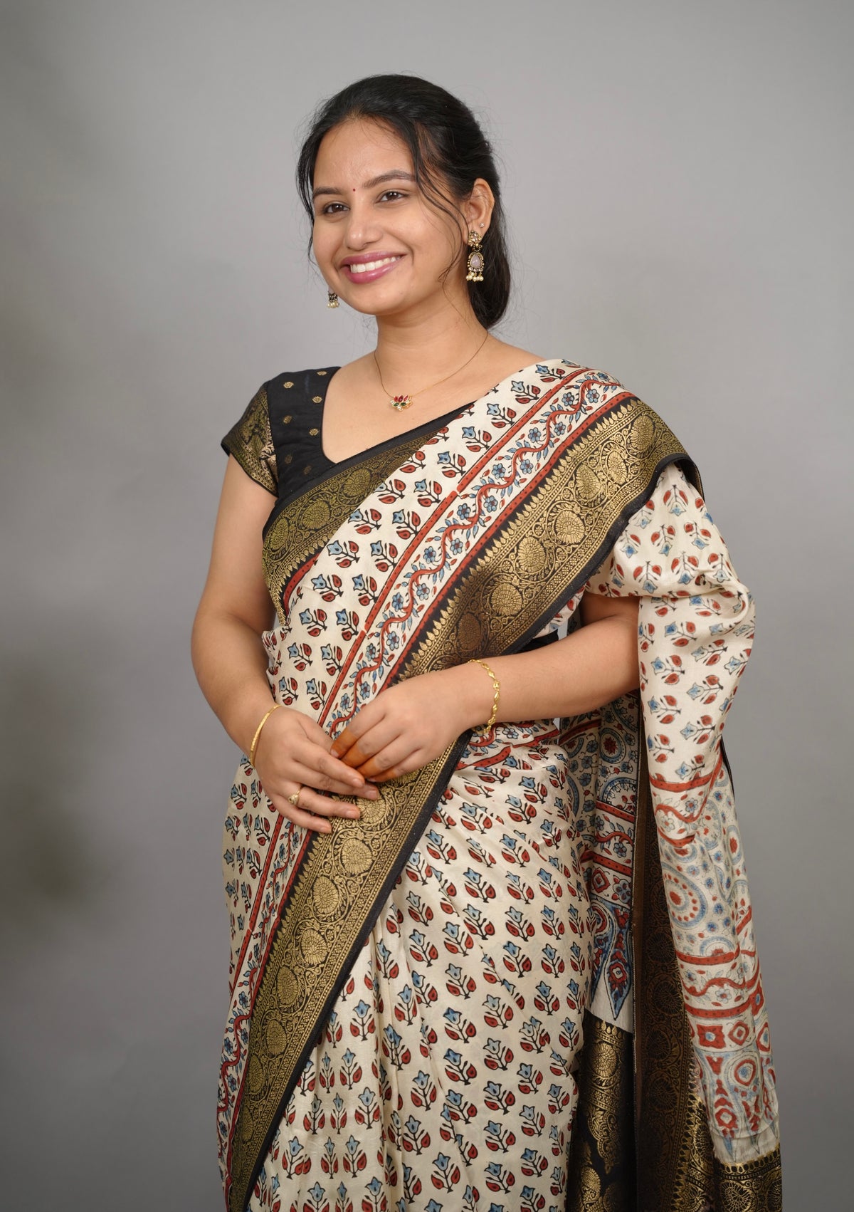 Cream Ajrakh Handblock printed Dola Silk Saree| Looms & Tassels