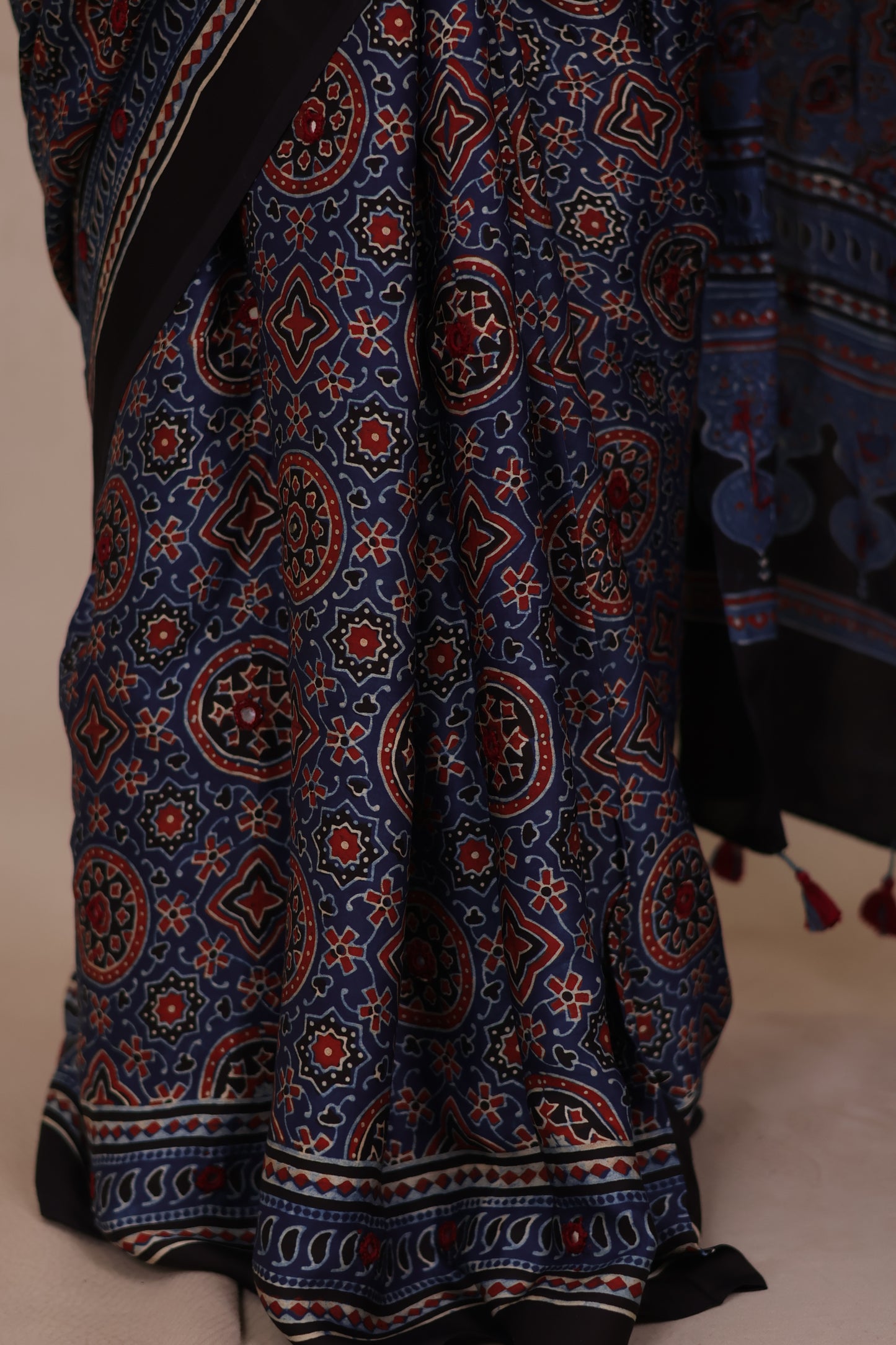 Indigo Handcrafted Ajrakh Modal Silk Saree with Authentic Banjara Mirror Work | Looms & Tassels