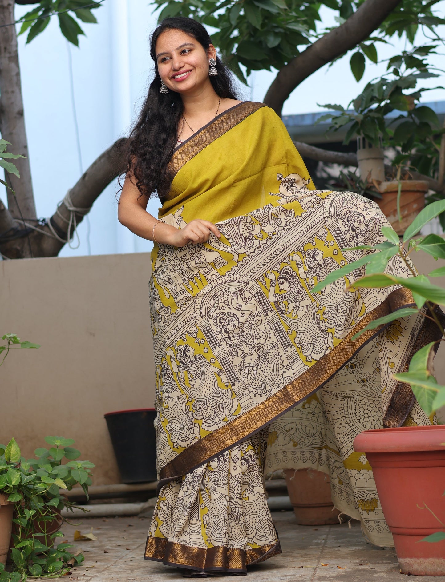 Mustard Traditional Folks Kalamkari Silk Handcrafted Nizam Border Saree