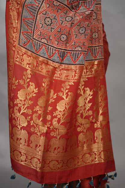 Maroon Ajrakh Handblock printed Dola Silk Saree| Looms & Tassels