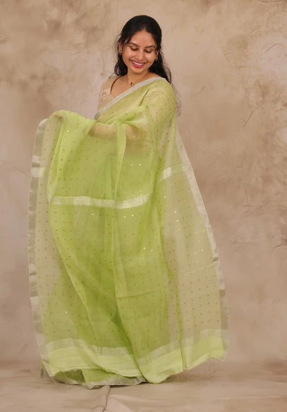 Pastel Lime Green Handwoven Muslin Silk Saree With Sequence Work | Looms & Tassels