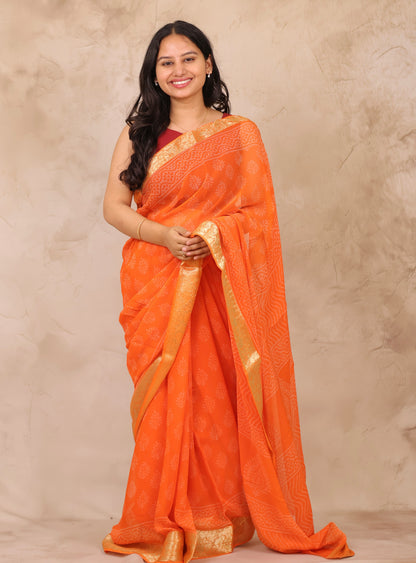Orange Chiffon Hand Block Printed Saree with Jari Border | Looms & Tassels