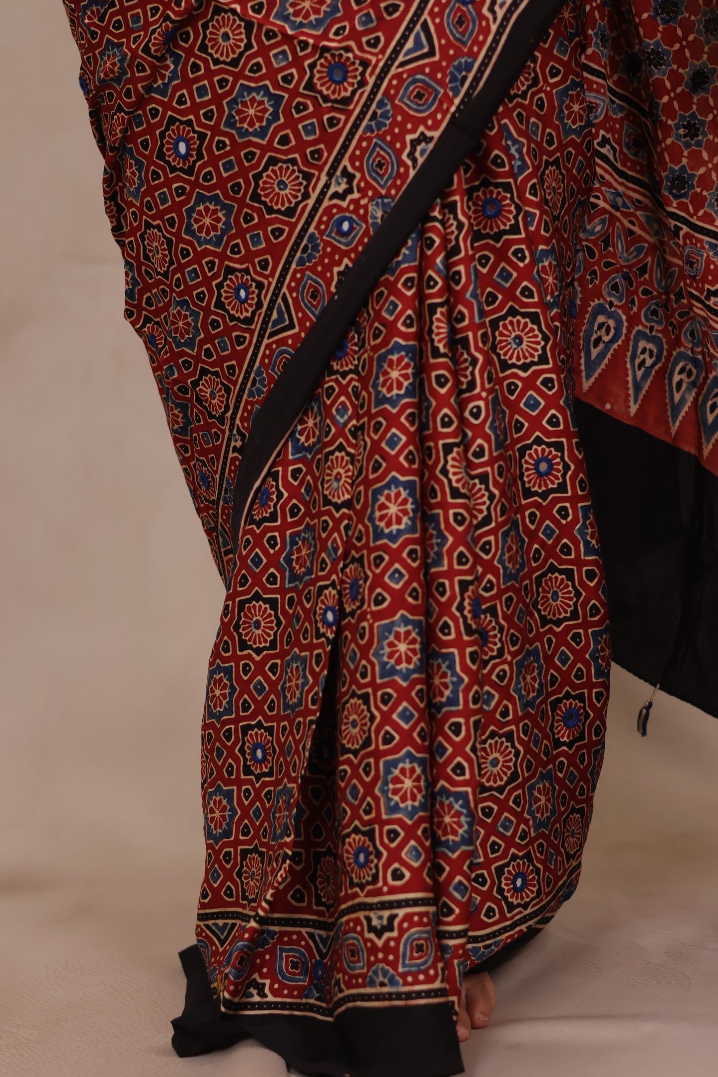 Red Handcrafted Ajrakh Modal Silk Saree with Authentic Banjara Mirror Work | Looms & Tassels