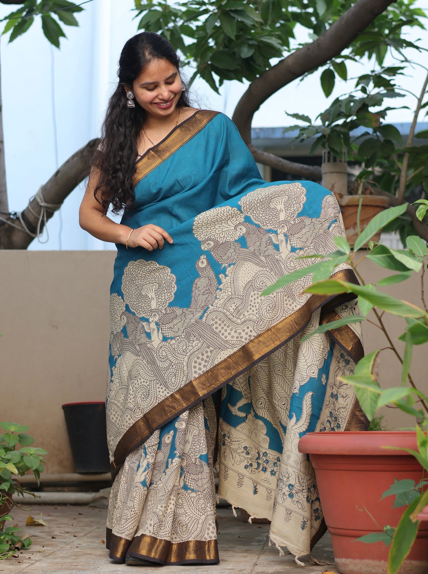 Teal Blue & Cream Traditional Folks Kalamkari Silk Handcrafted Nizam Border Saree