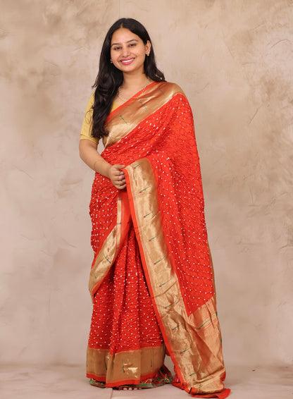 Orange Handcrafted Bandhani Paithani Dola Silk Saree | Looms & Tassels