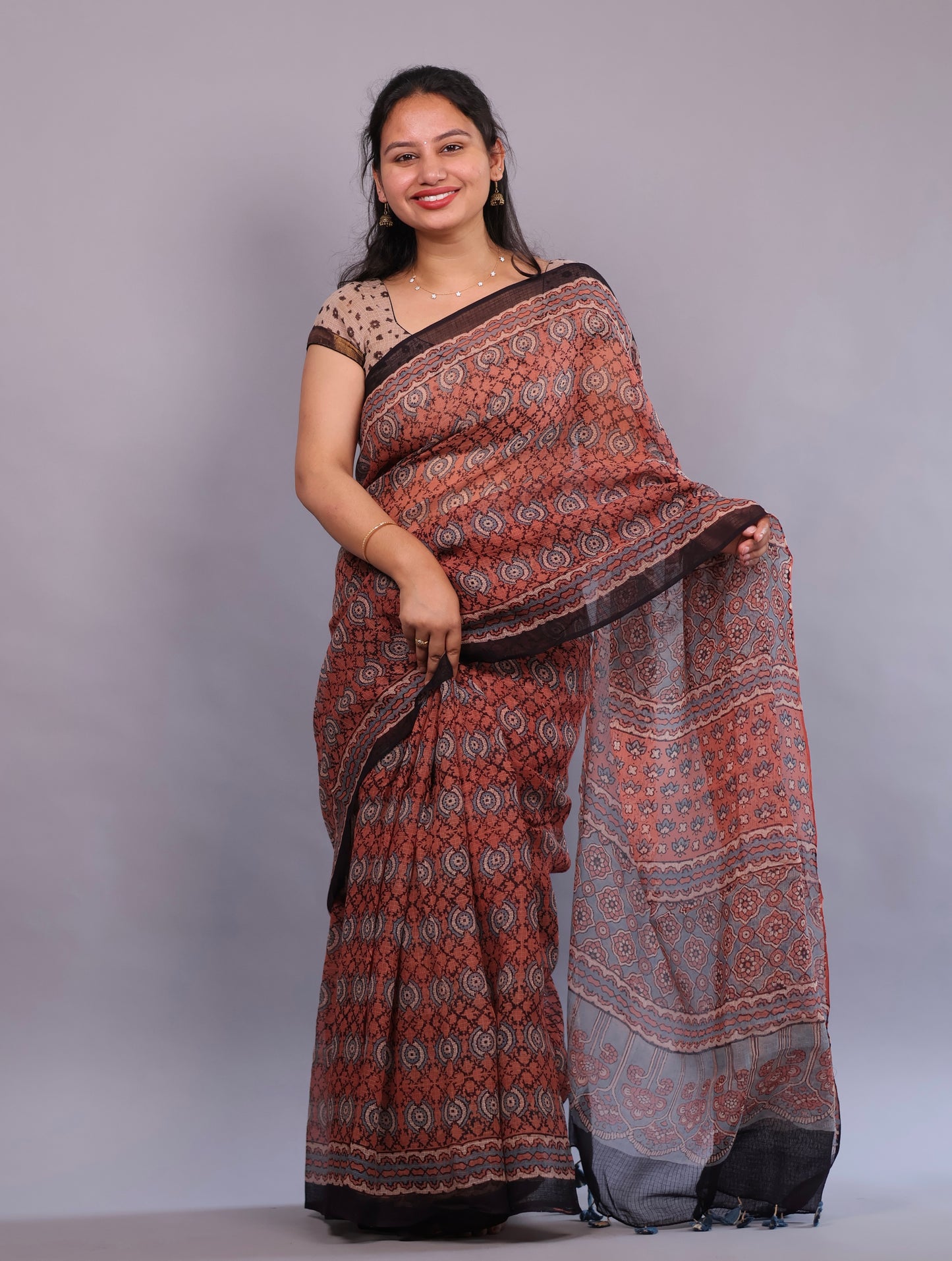 Rust Orange Ajrakh Hand Block Printed Kota Doria Saree | Looms & Tassels