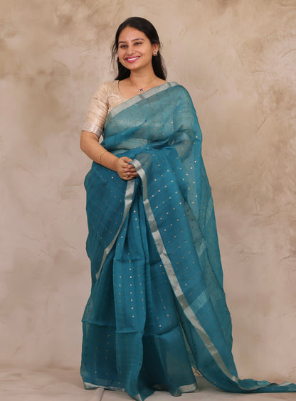 Teal Blue Handwoven Muslin Silk Saree With Sequence Work | Looms & Tassels