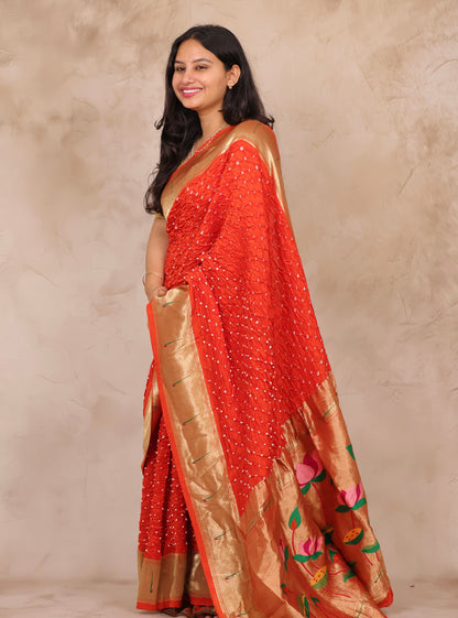 Orange Handcrafted Bandhani Paithani Dola Silk Saree | Looms & Tassels