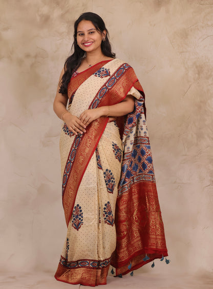 Cream Dotted Floral Ajrakh Handblock printed Dola Silk Saree | Looms & Tassels