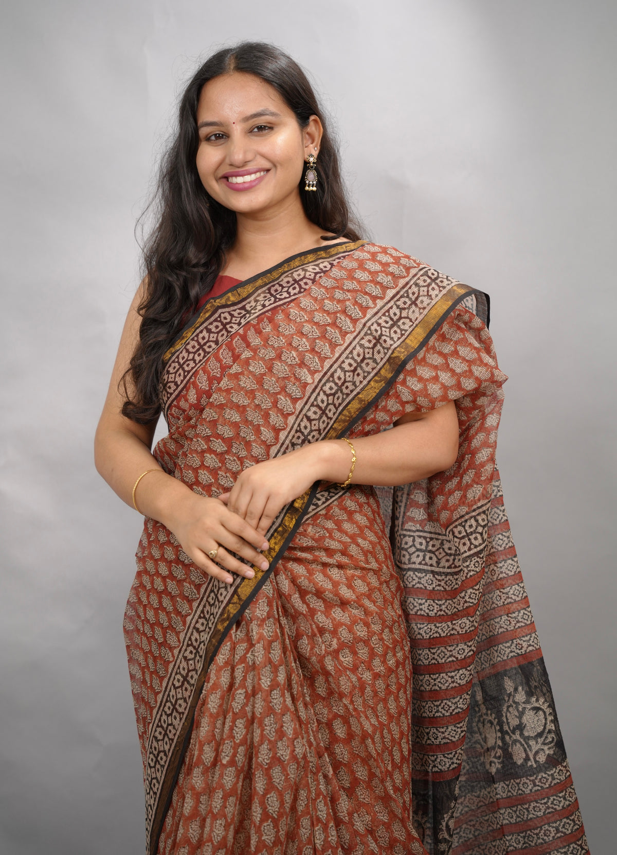 Maroon Pure Kota Doria Saree with Bagru Handblock Prints | Looms & Tassels