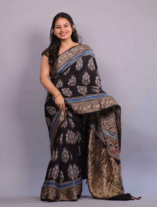 Black Flower Butta Ajrakh Handblock printed Dola Silk Saree | Looms & Tassels