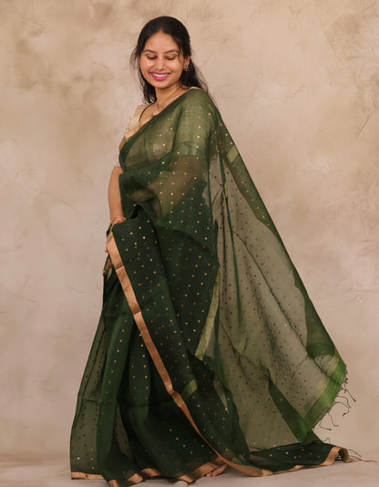 Green Handwoven Muslin Silk Saree With Sequence Work | Looms & Tassels