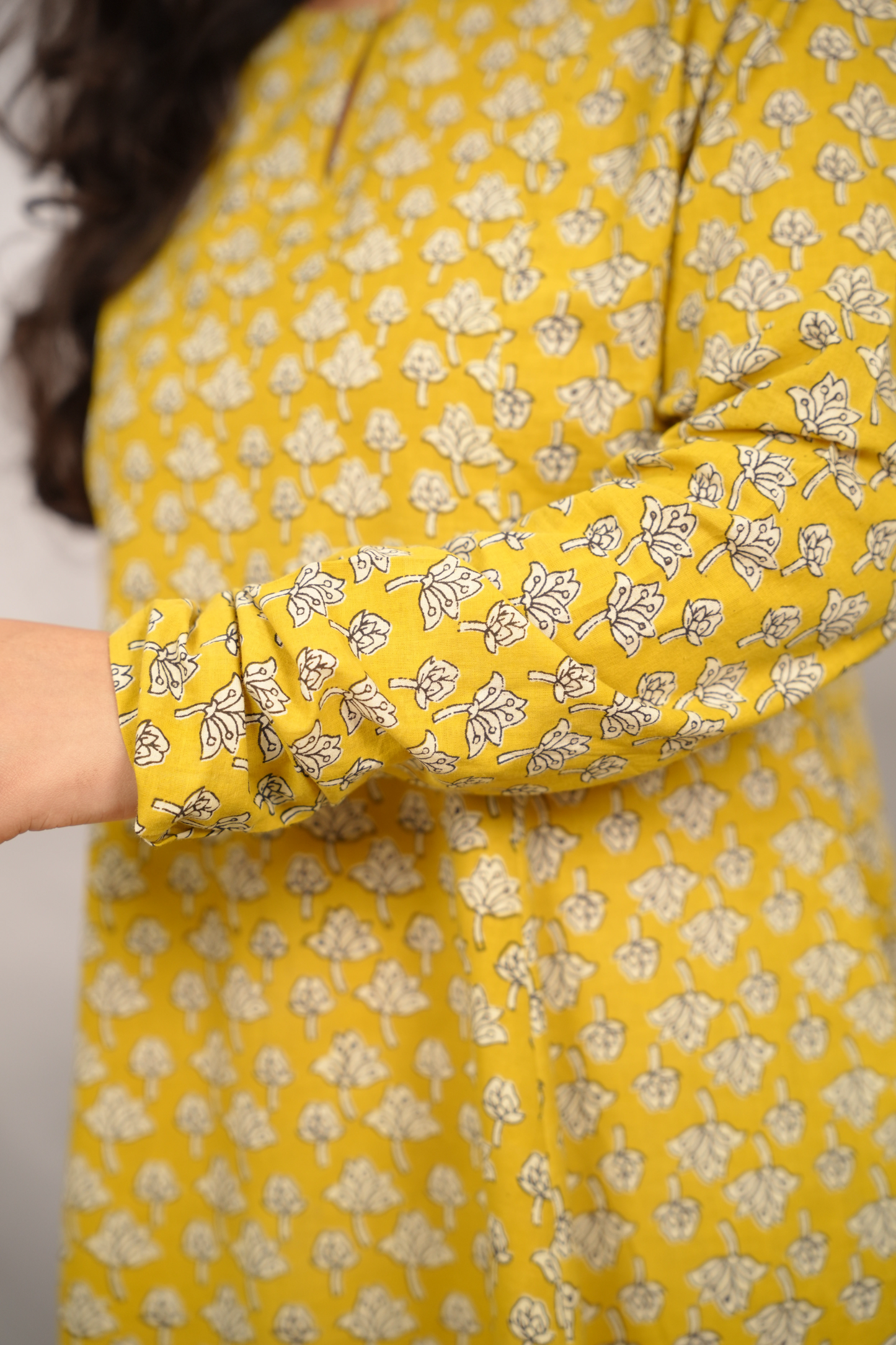 Mustard Pure Mul Cotton Kali Kurta with Chudi Sleeves | Looms & Tassels
