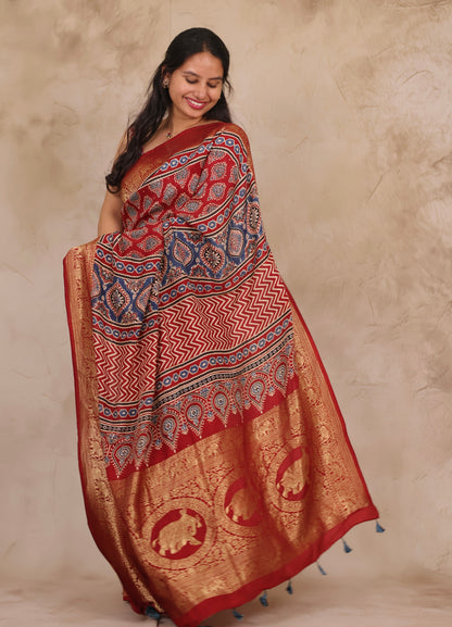 Maroon Butta Ajrakh Handblock printed Dola Silk Saree | Looms & Tassels