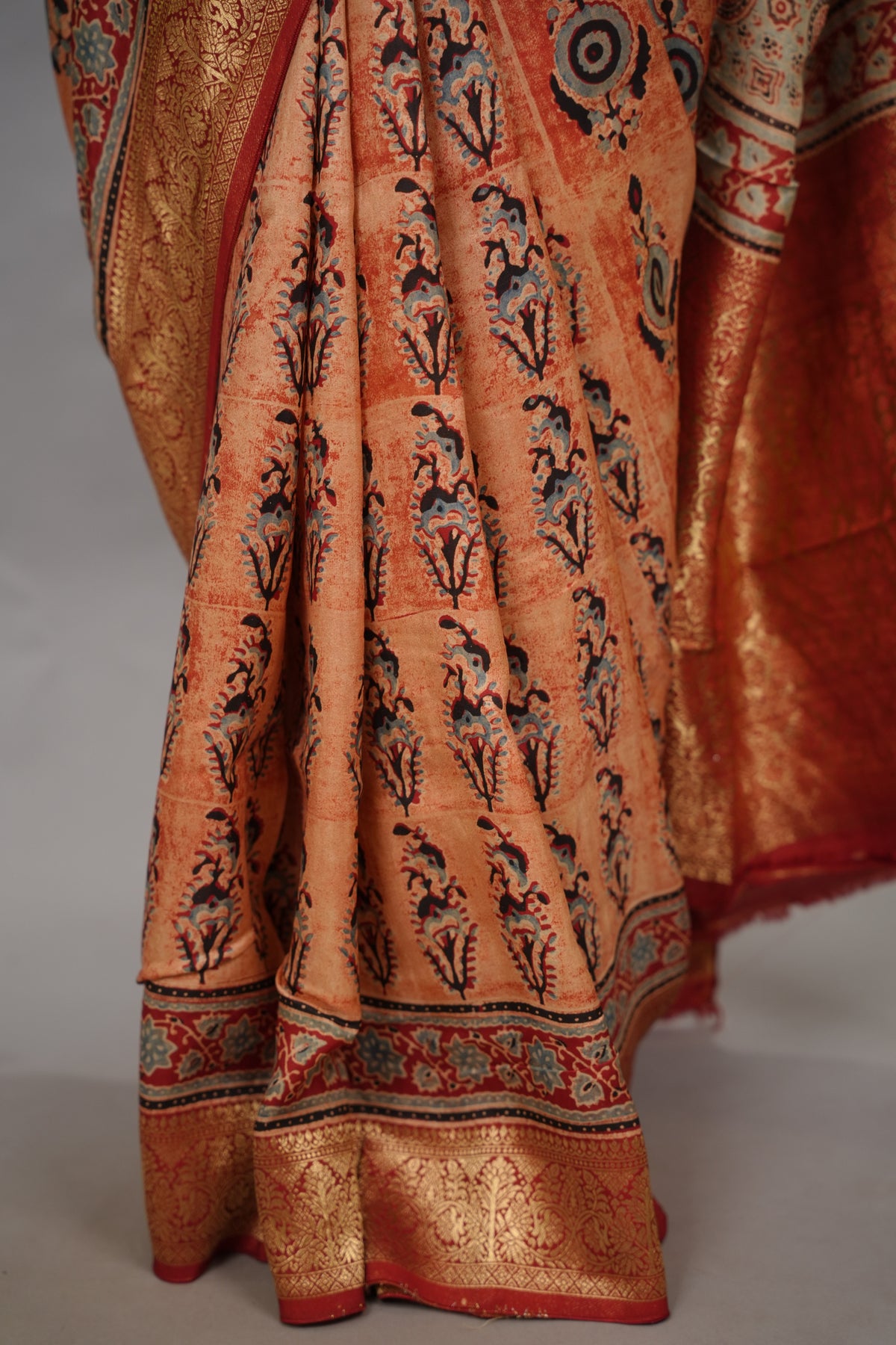 Onion Pink Ajrakh Handblock printed Dola Silk Saree| Looms & Tassels