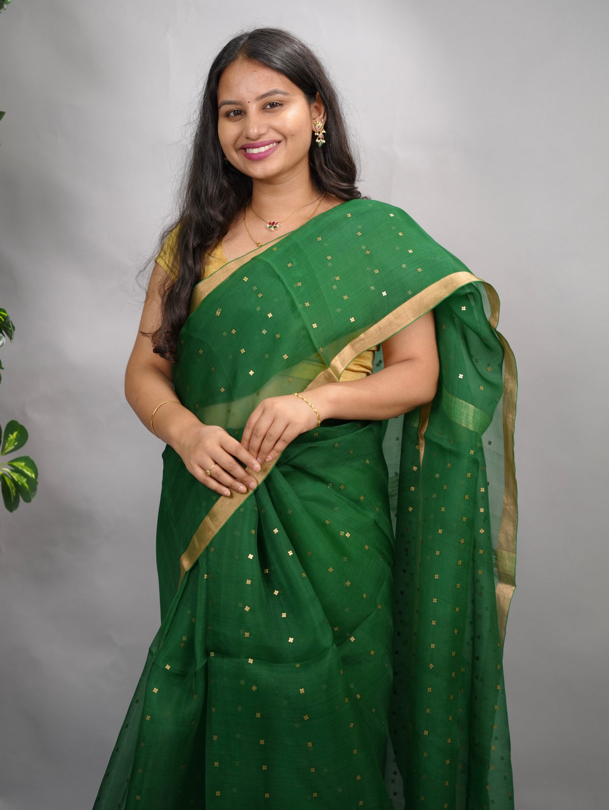 Bottle Green Handwoven Muslin Silk Saree With Sequence Work | Looms & Tassels