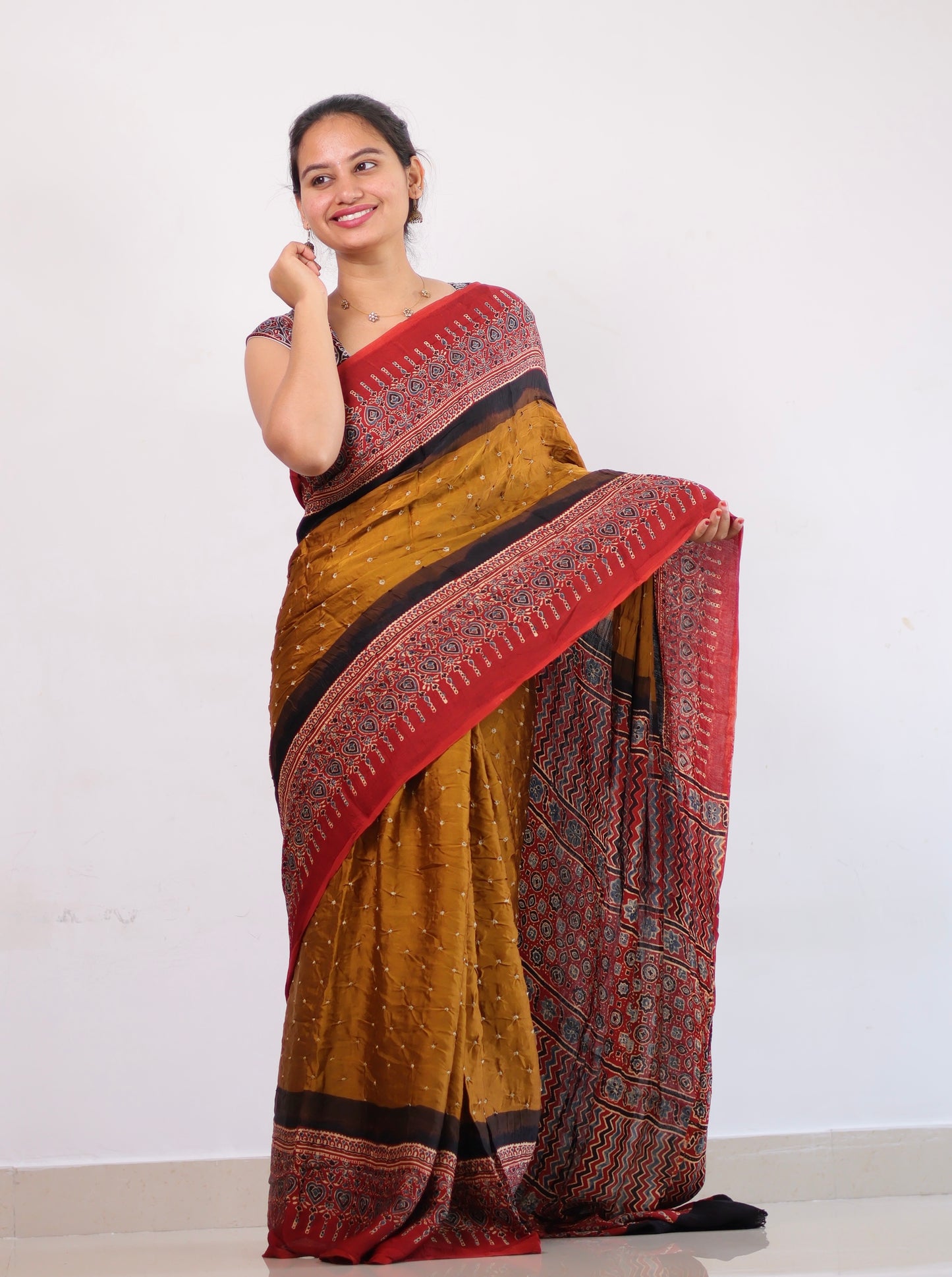 Mustard Ajrakh Bandhej Modal Silk Saree