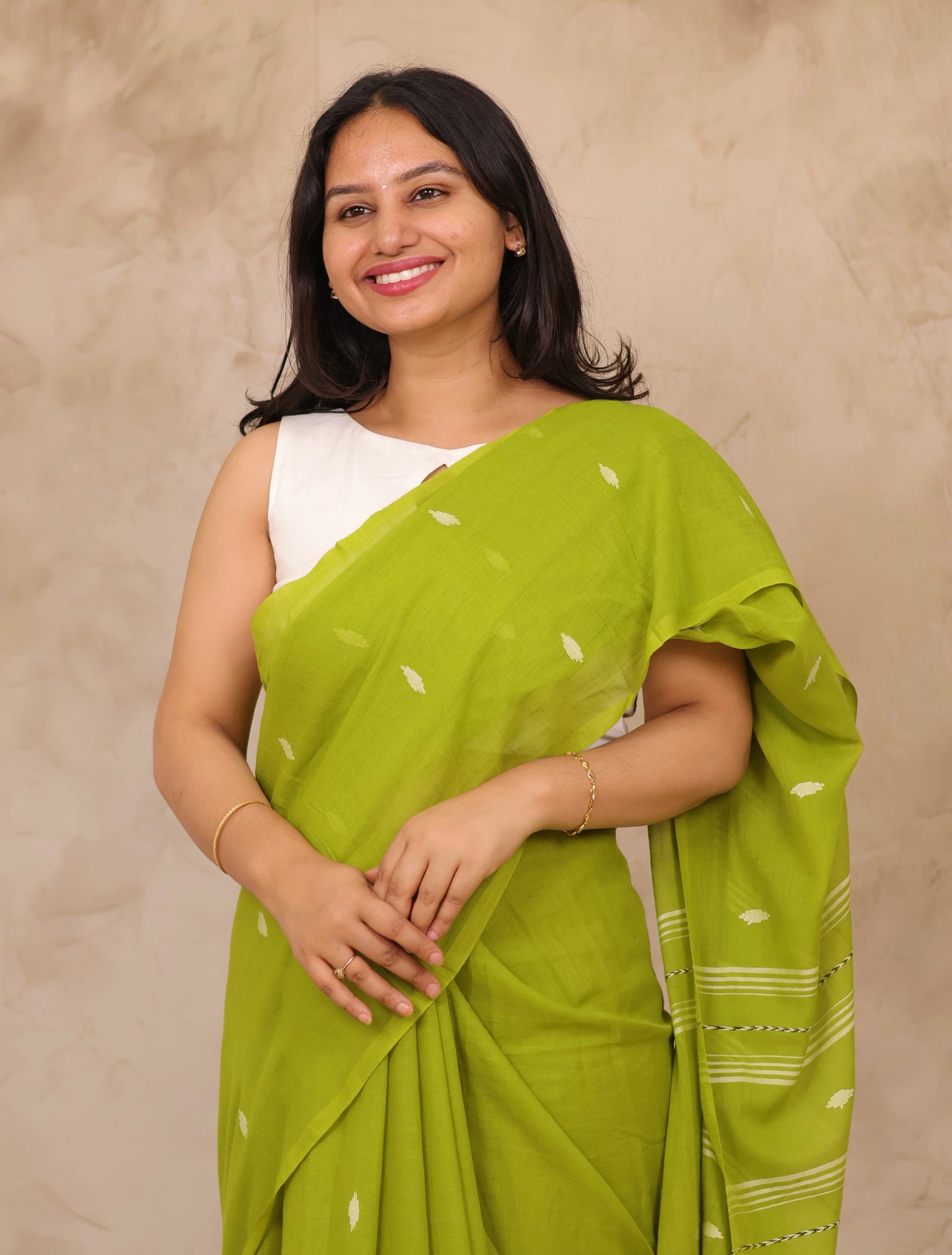 Parrot Green Malai Cotton Saree with Butta Weaving | Looms & Tassels