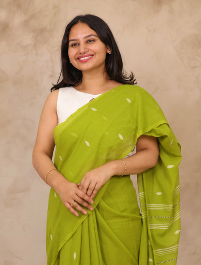 Parrot Green Malai Cotton Saree with Butta Weaving | Looms & Tassels