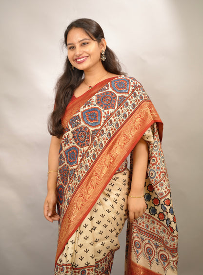 Cream Ajrakh Handblock printed Dola Silk Saree | Looms & Tassels