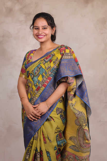 Hand Drawn Pen Kalamkari Parrot Green And Blue Bangalore Silk Kanchi Border Saree | Looms & Tassels