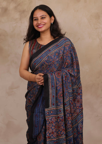 Indigo Handcrafted Ajrakh Modal Silk Saree with Authentic Banjara Mirror Work | Looms & Tassels