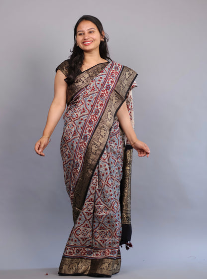 Cream Geometrical & Floral Ajrakh Motifs Handblock printed Dola Silk Saree | Looms & Tassels